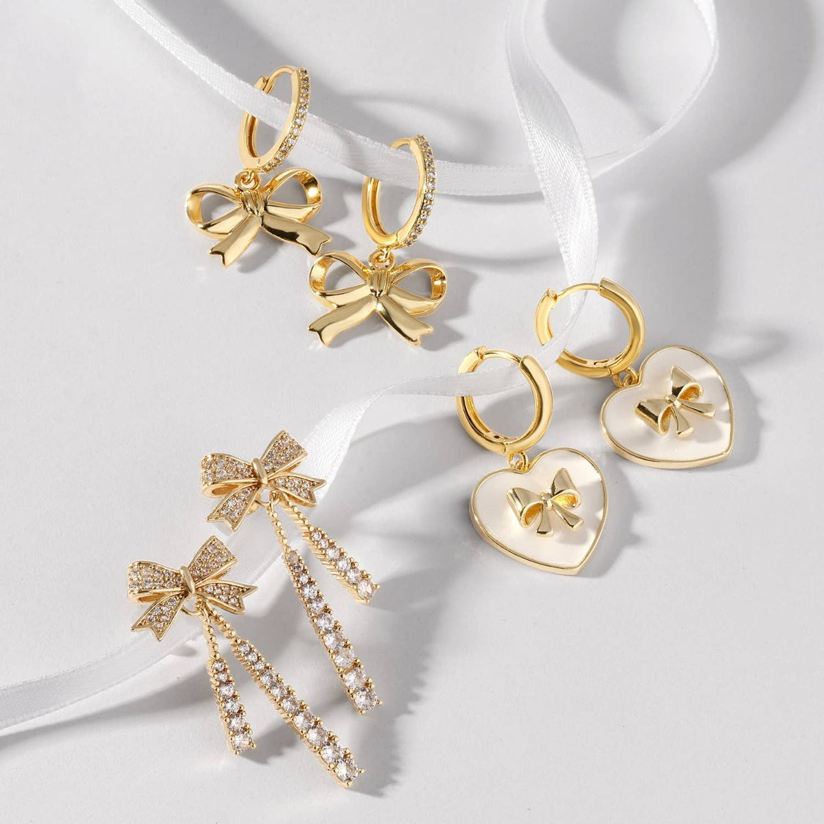 Bow Heart Huggie-Splendid Iris-R3vel Threads, Women's Fashion Boutique, Located in Hudsonville, Michigan