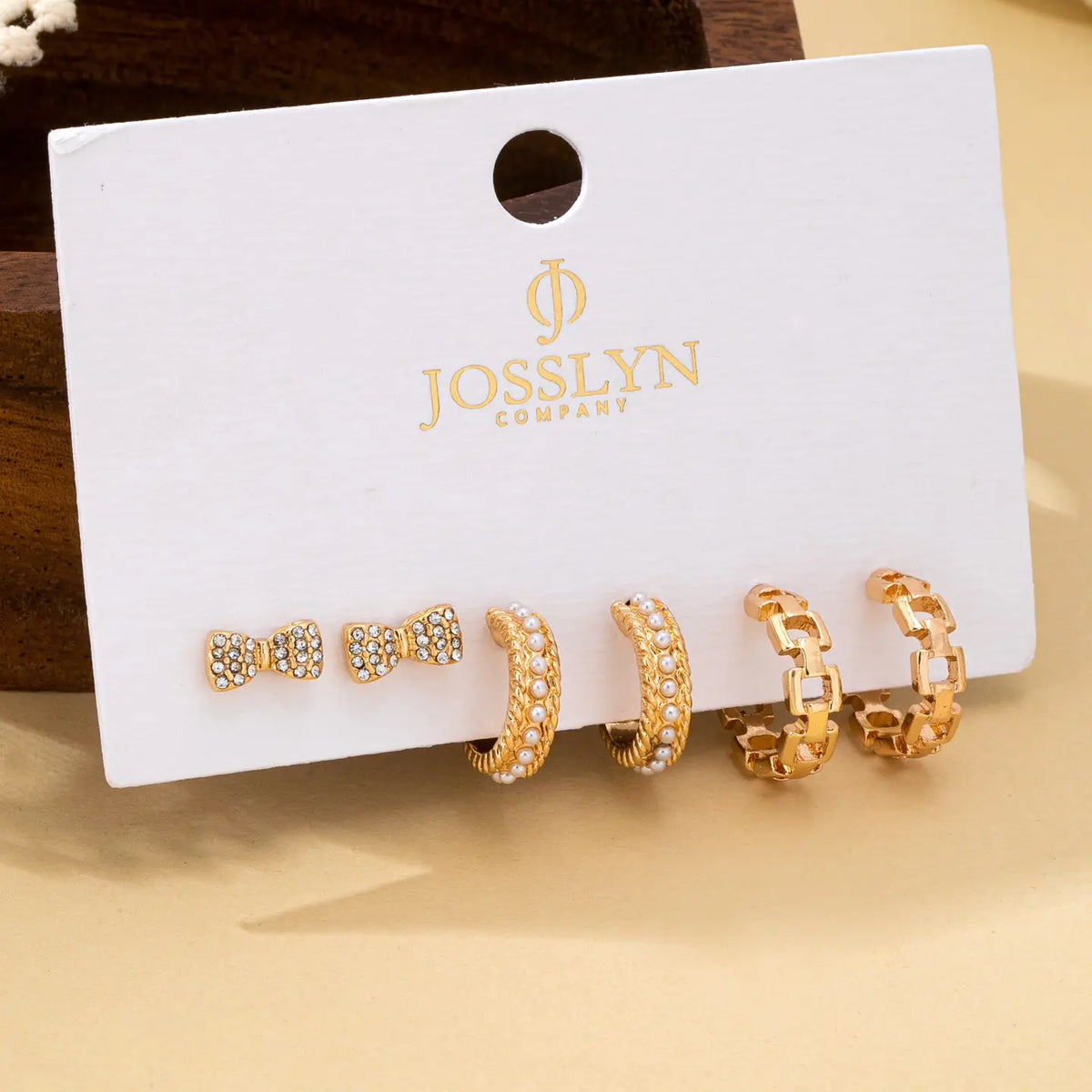 Trio Bow, Pearl Huggie and Chain Hoop Earring Set