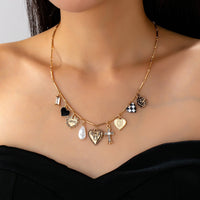 Checker heart charm necklace-JOSSLYN by wall to wall-R3vel Threads, Women's Fashion Boutique, Located in Hudsonville, Michigan