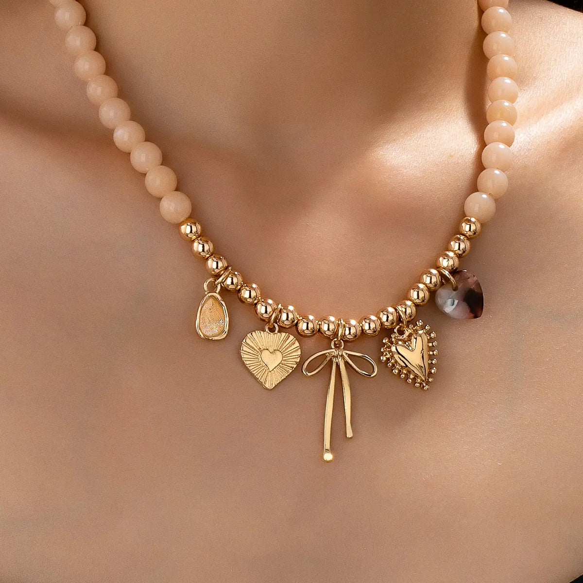 Beige Beaded Bow Heart Rhinestone Charm Necklace
